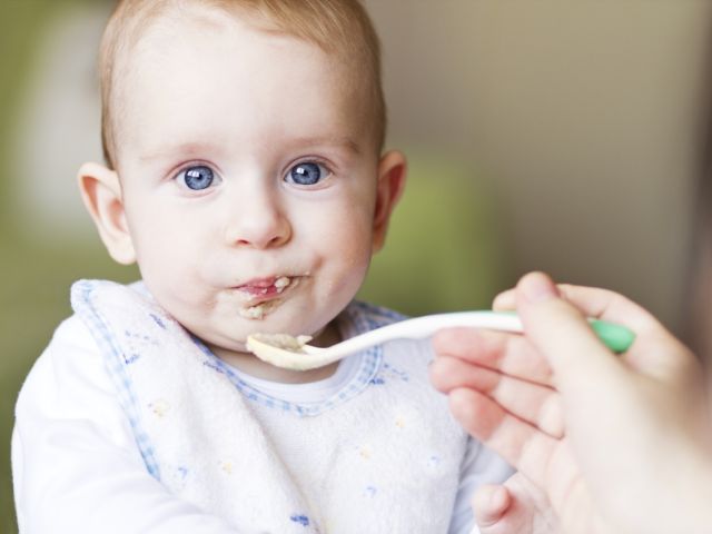 Baby eating oatmeal